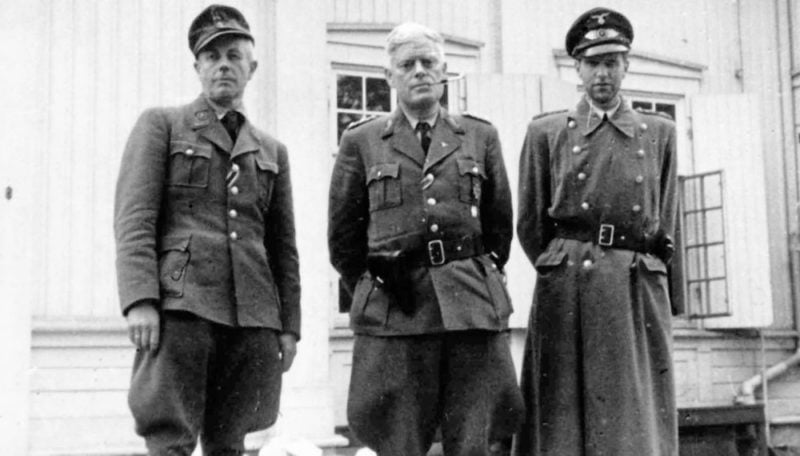 sverre risnes På Skallum gård i Bærum den 11. mai 1945: Sverre Parelius Riisnæs (justisminister i Quisling-regjeringen), Jonas Lie (politiminister) og Henrik Rogstad (hirdsjef)